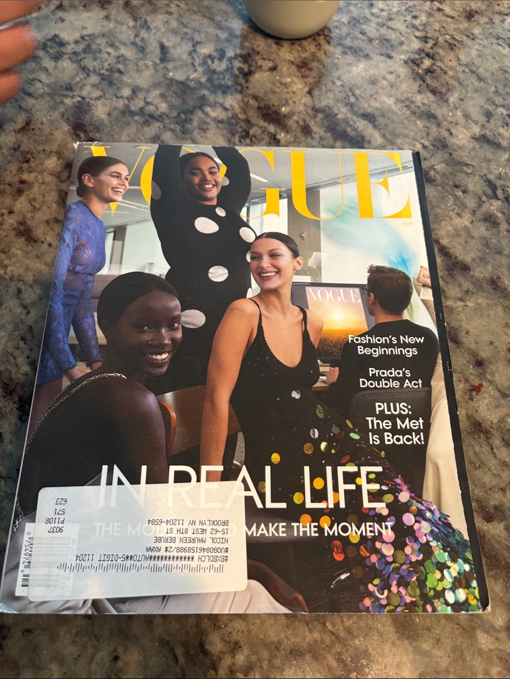 Vogue — Black Dresses with Colorful Sequin Accents and Yellow Masthead